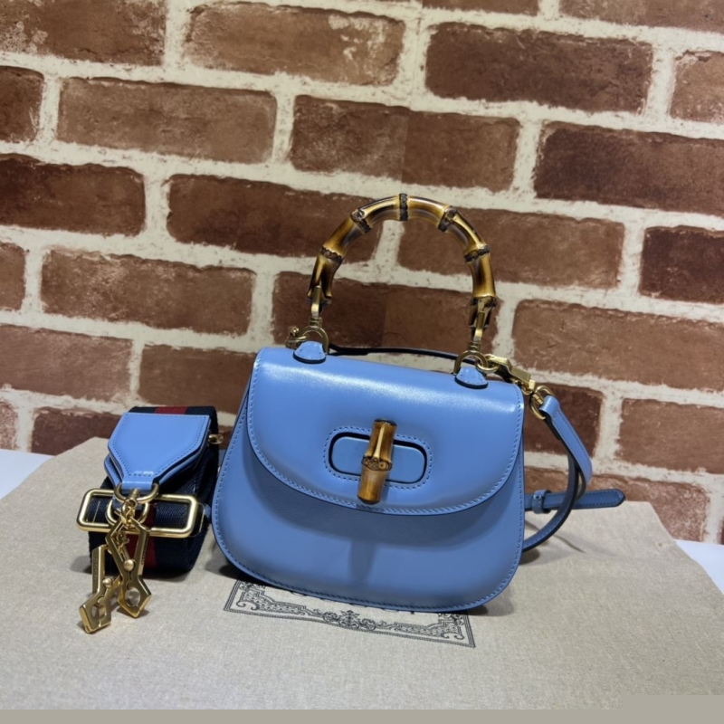 G*u*i top handle bags